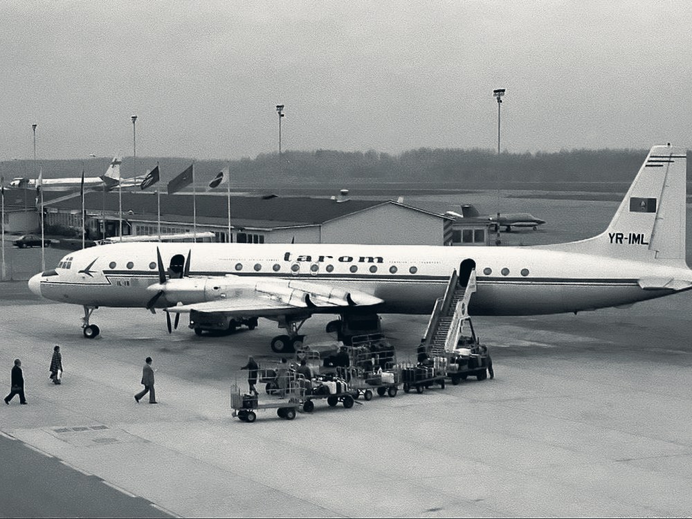Historical photograph of a Finnair aircraft during ground handling